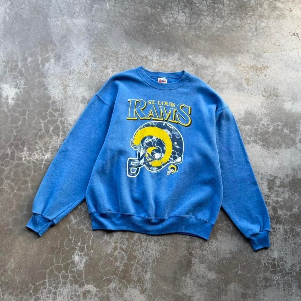 Vintage 1990's St Louis Rams Blue graphic sweatshirt  Tagged size XL